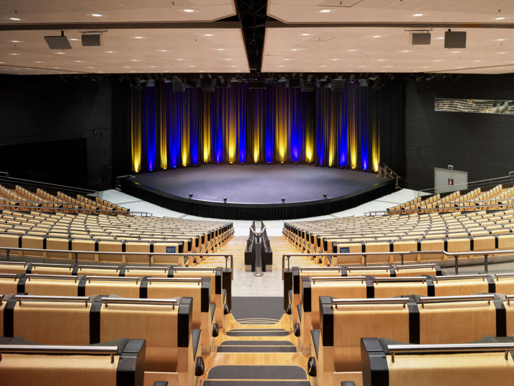 Congress hall at Svenska Mässan Gothia Towers - featuring the seats and the scen taken frm above..
